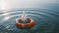 A liferaft in the ocean.